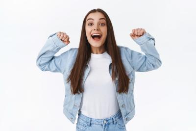 Brunette Woman Celebrating Success with Joyful Jumping – Free Stock Photos for Download