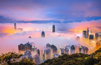 Skyscrapers in Mist at Night – Free Download of Stunning Cityscape Stock Photo