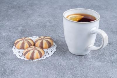 Zebra Pattern Biscuits and Cup of Tea on Marble Surface – Free Stock Photo, Download Free