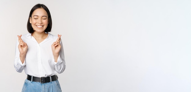 Young Korean Woman Praying and Making a Wish – Free Stock Photo for Download