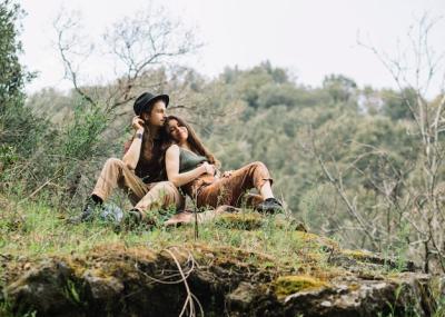 Hiker Couple in Love Sitting in Nature – Free Stock Photo for Download