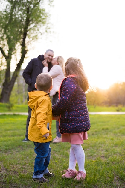 Happy Parents Enjoying Nature with Kids – Download Free Stock Photo