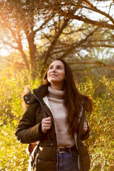 Smiley Woman Enjoying Nature in the Sun – Free Stock Photo for Download