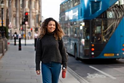 Young Woman Walking in the City – Free to Download