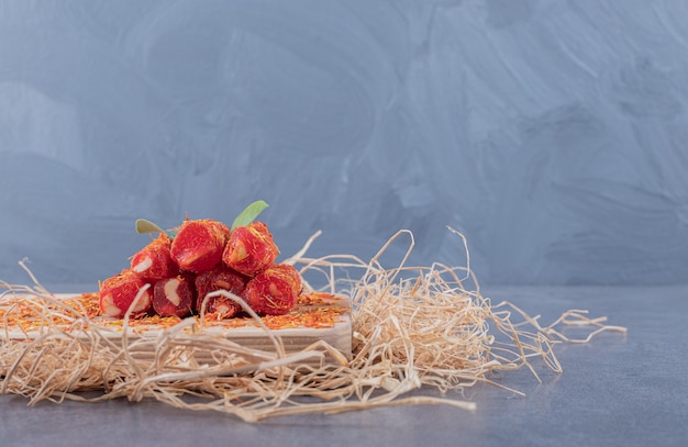 Turkish Delight Rahat Lokum with Pistachios on Wooden Board – Free Download