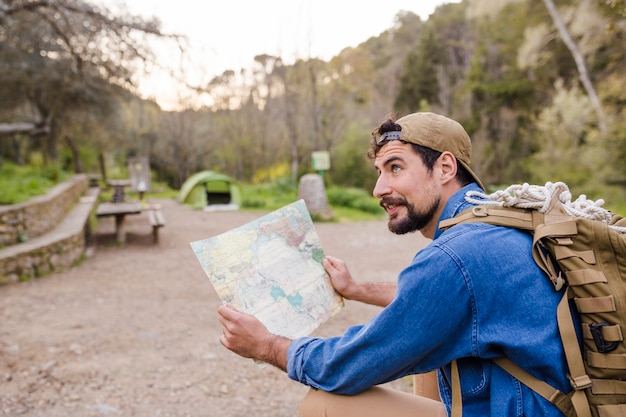 Explore Nature: Tourist with Map â Free Download