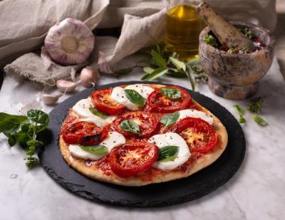 Fresh Pizza with Mozzarella, Tomatoes, and Basil – Free Download