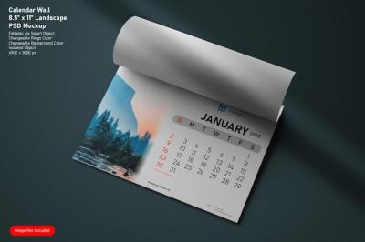 Editable Realistic Mockup of a Flat Lay Horizontal 85×11 Inches Wire Bound Wall Calendar – Free Download