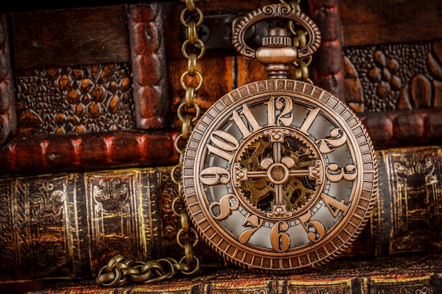 Vintage Antique Pocket Watch Surrounded by Old Books – Free Download