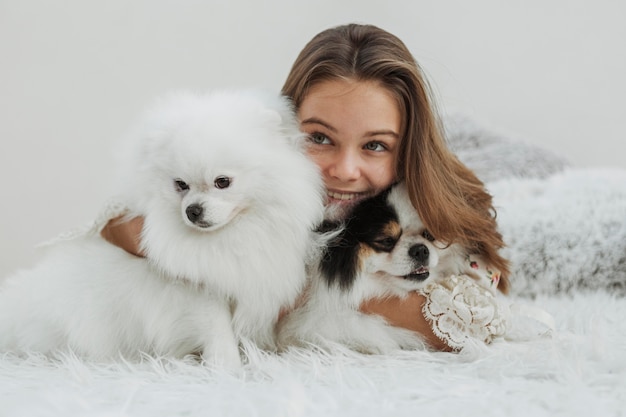 Girl and Cute White Puppies Front View – Free Stock Photo, Download for Free