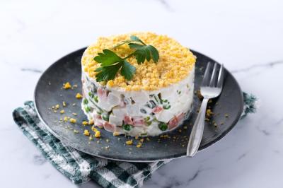 Olivier Salad on Marble Table for Christmas Dinner – Free Download