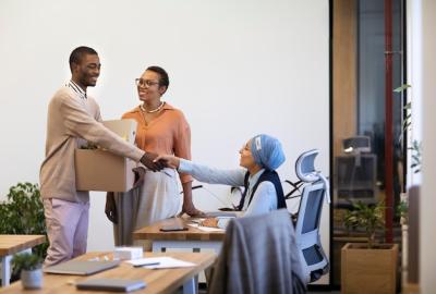 New Employee Introduction: Man with Box of Belongings – Free Stock Photo for Download