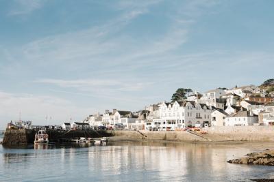 Beautiful Waterfront Apartments Under a Blue Sky – Free Stock Photo Download