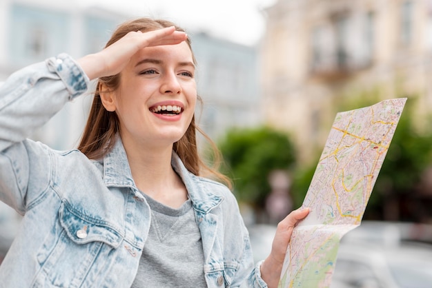 City Traveler Holding a Map – Free Stock Photo, Download Free