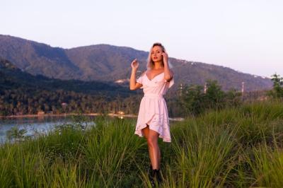 Young Caucasian Woman Relaxing in Park with Tropical Sea View – Free Download