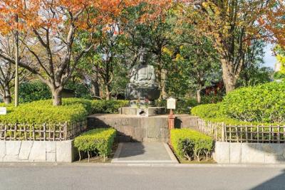 A Buddha Statue Outside Sensoji Temple in Tokyo – Free Download