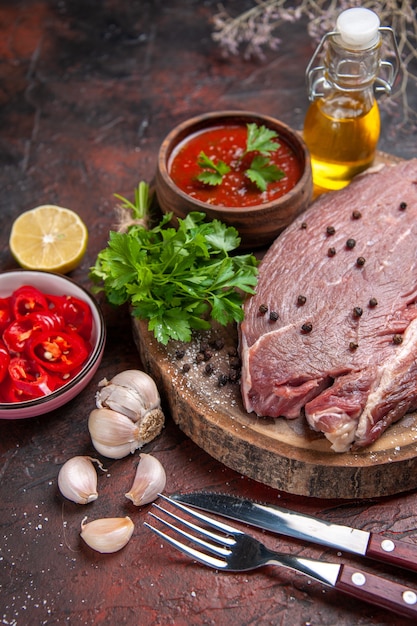 Red Meat on Wooden Tray with Garlic, Green Ketchup, and Chopped Pepper Oil – Free to Download