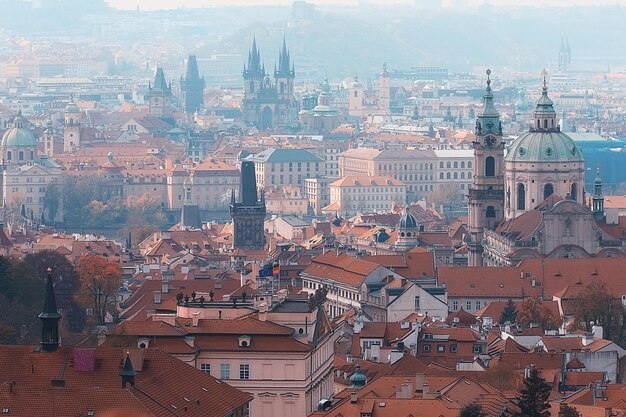 Panoramic View of Prague’s Red Roofs and Yellow Autumn Landscape – Free Download