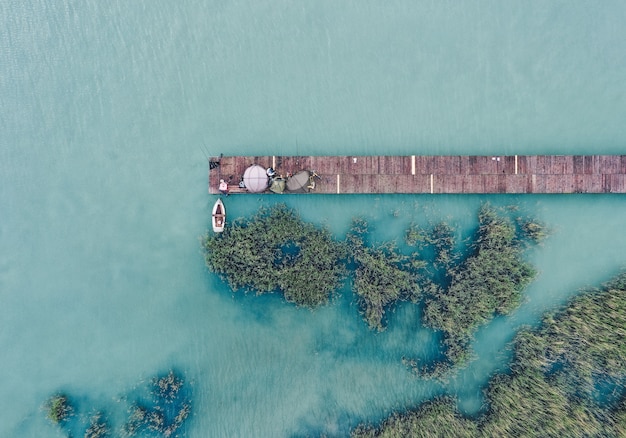 Wooden Dock and Fishing Boat Overhead View – Free Download