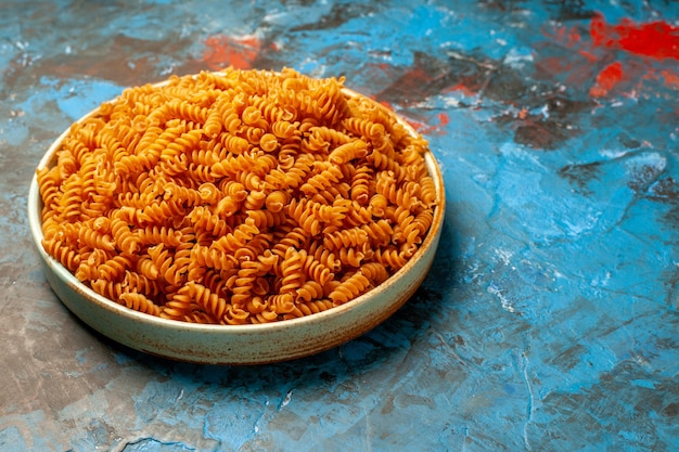 Raw Italian Pastas in a White Bowl on Blue Background – Free Stock Photo, Download for Free