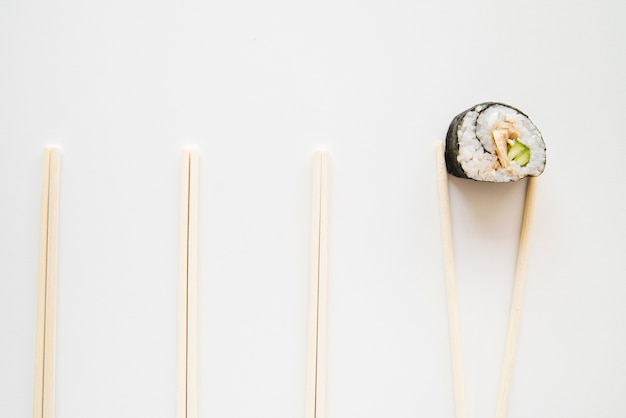 Top View Sushi Roll with Chopsticks – Free to Download