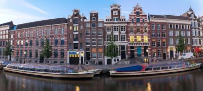 Amsterdam Canal City View with Typical Dutch Houses and Boats – Free Download