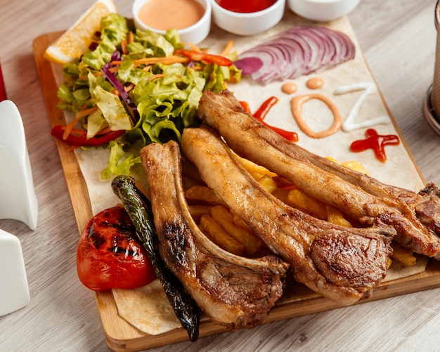 Fried Ribs with French Fries and Tomato Salad – Free Download