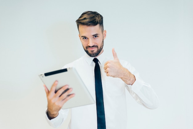 Man with a Tablet Giving a Thumbs Up – Free Stock Photo, Download Free Stock Photo