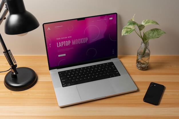 High Angle Laptop Mockup in a Minimalist Setting – Free to Download