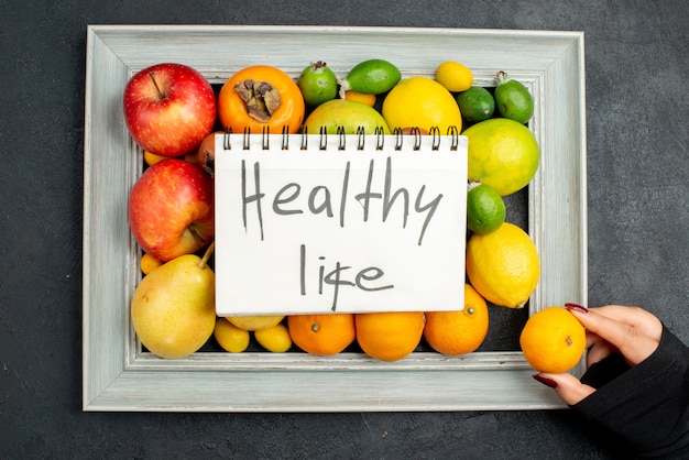 Healthy Life Inscription with Fresh Fruits on Dark Background – Free Stock Photo Download