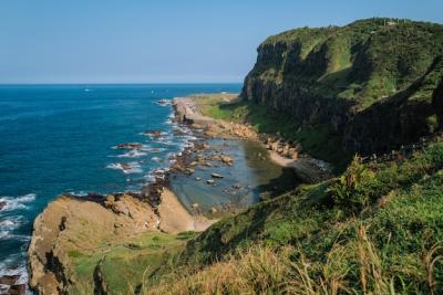 Stunning Green Hills and Rocky Coastline – Free Stock Photo for Download