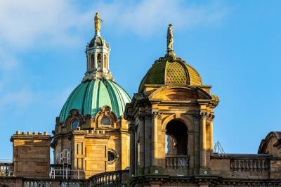 A Stunning Building Featuring a Green and Gold Dome – Free Stock Photo Download