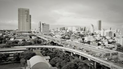 High Angle View of Bridge and Buildings Against Cloudy Sky – Free Stock Photo for Download