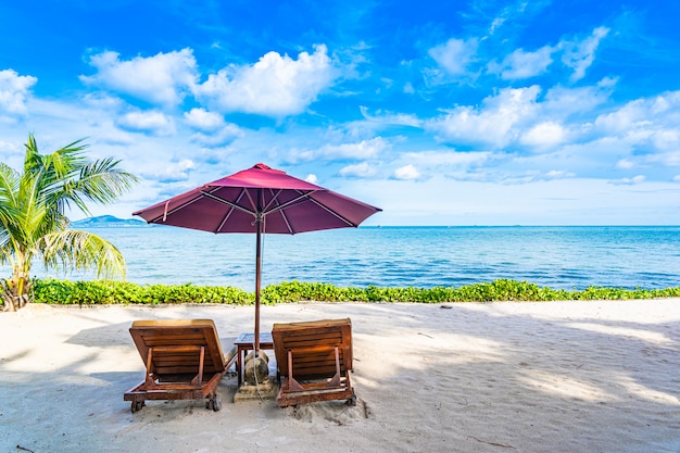 Stunning Beach Landscape with Chair, Umbrella, and Coconut Palm – Free Download