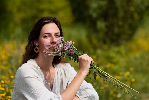 Woman Smelling Flowers – Free Download