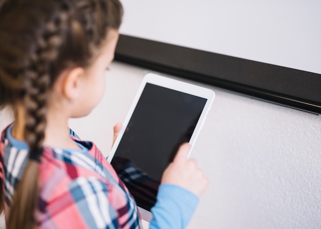 An Overhead View of a Girl Using a Digital Tablet – Free Stock Photo, Download for Free