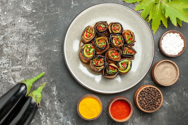 Stuffed Eggplant Rolls with Spices on Grey Surface – Free Download