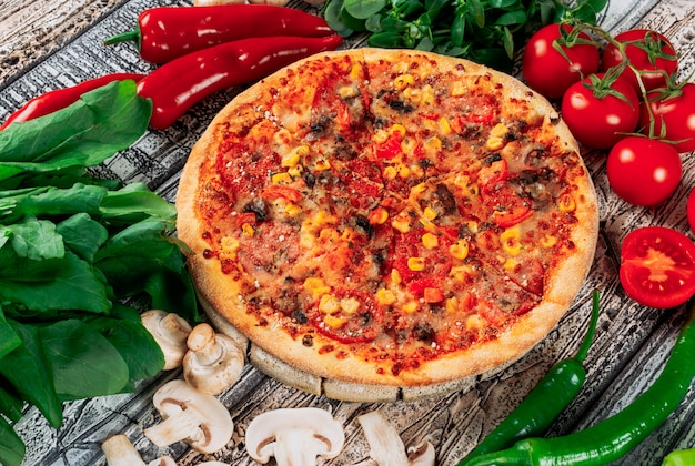 Pizza with Peppers, Mushrooms, Tomatoes, and Mint Leaves – Free Stock Photo, Download Free