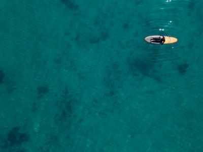 Man Laying on Surfboard – Free Download Free Stock Photo