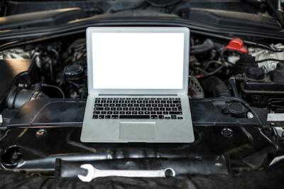 Laptop on a Car Engine – Free Download, Free Stock Photo