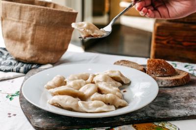 A Front View of Dough Meal with Minced Meat and Bread Loafs – Free Stock Photo for Download