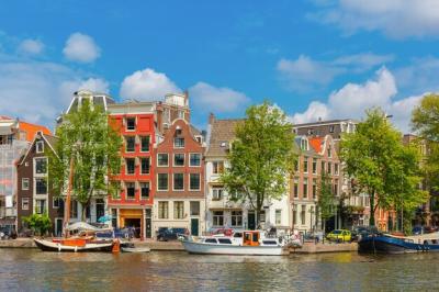 Amsterdam Canals and Typical Houses: Scenic City View – Free Download