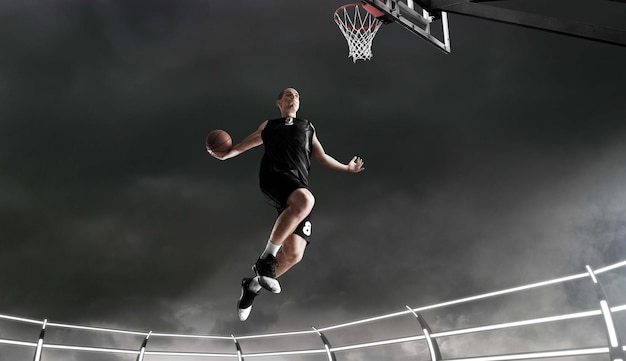 Dynamic Basketball Player in Action Against a Sunset – Free Download