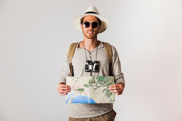 Hipster Traveler with Sunglasses and Map – Free Download