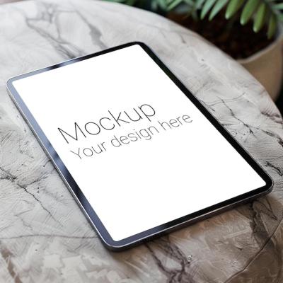 Black Tablet Mockup on Marble Table with Plant – Free Download