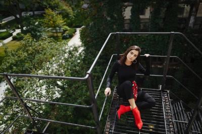 Brunette Model Posing on a Black Staircase – Free Download