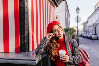 Blue-Eyed Woman in Beret Posing Dreamily with Coffee – Free Stock Photo for Download