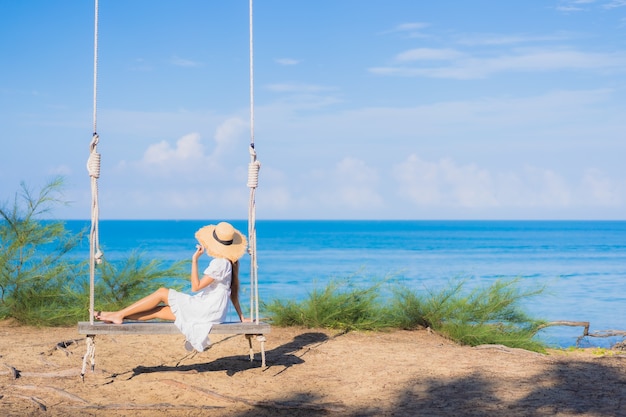 Beautiful Young Asian Woman Relaxing on a Beach Swing – Free Stock Photo, Download for Free