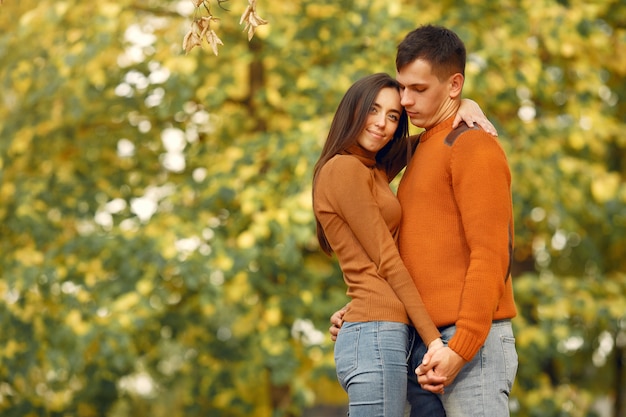 Beautiful Couple Enjoying Autumn Moments – Free Stock Photo for Download