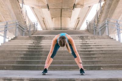 Healthy Young Woman Stretching Before Fitness and Exercise – Free Stock Photo for Download